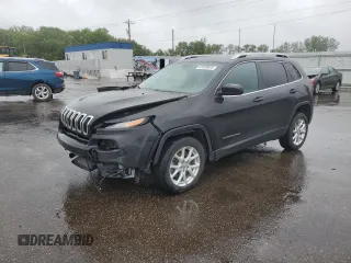 2014 Jeep Cherokee Latitude z VIN 1C4PJLCBXEW148123, wystawiony jako Copart lot #57523825 z przebiegiem 119 270 mil mil oraz Szkoda całkowita • Salvage title. Historia ofert i sprzedaży dostępna na DreamBid. Obrazek 1.
