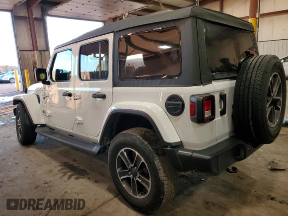 2023 Jeep Wrangler Sahara with VIN 1C4HJXEN1PW659600, listed as a Copart auction lot 85228074 with 21,623 mi miles and Salvage Title. Bid and sale history available at carsss.com. Image 2.
