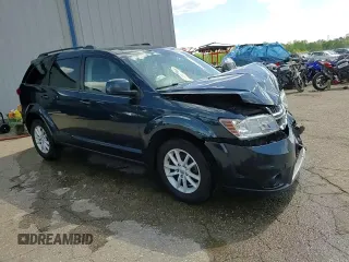 2013 Dodge Journey SXT with VIN 3C4PDCCG1DT637534, listed as a Copart auction lot 56992205 with 128,531 mi miles and Clean title. Bid and sale history available at DreamBid. Image 14.
