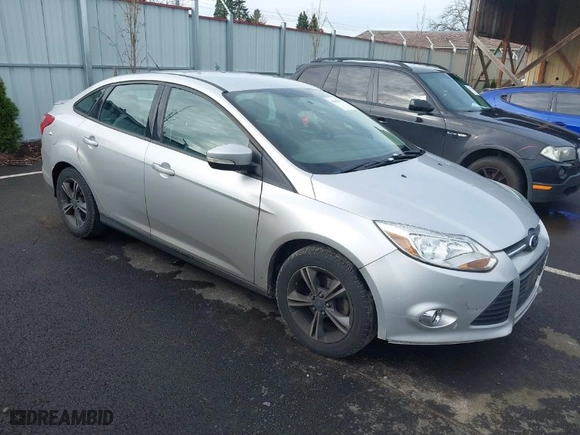 2014 Ford Focus SE with VIN 1FADP3F23EL454603, listed as a IAAI auction lot 41896721 with 210,548 mi miles. Bid and sale history available at carsss.com. Image 1.