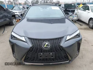 2023 Lexus UX 250h F Sport z VIN JTHB6JBH9P2132431, wystawiony jako IAAI lot #42137625 z przebiegiem 15 923 mil mil oraz . Historia ofert i sprzedaży dostępna na DreamBid. Obrazek 12.