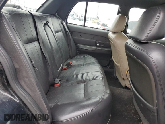 2005 Mercury Grand Marquis LS Premium z VIN 2MEFM75W25X627343, wystawiony jako Copart lot #52307095 z przebiegiem 213 331 mil mil oraz Tytuł czysty. Historia ofert i sprzedaży dostępna na DreamBid. Obrazek 10.