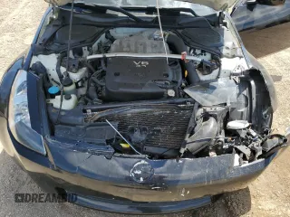 2004 Nissan 350Z Enthusiast z VIN JN1AZ34D44T160821, wystawiony jako Copart lot #55881325 z przebiegiem 151 293 mil mil oraz Szkoda całkowita • Salvage title. Historia ofert i sprzedaży dostępna na DreamBid. Obrazek 11.