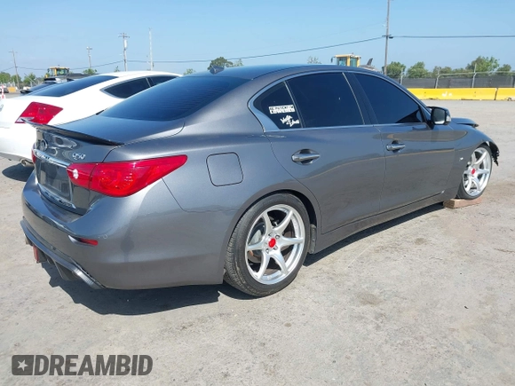 2014 Infiniti Q50 Premium with VIN JN1BV7AP5EM672766, listed as a IAAI auction lot 42107952 with 66,929 mi miles. Bid and sale history available at carsss.com. Image 4.