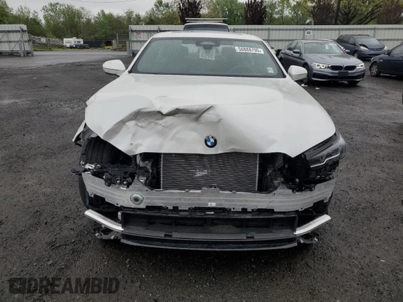 2024 BMW 5 Series 530i xDrive with VIN WBA53FJ01RCP97253, listed as a Copart auction lot 50888795 with 11,985 mi miles and Salvage title. Bid and sale history available at DreamBid. Image 5.