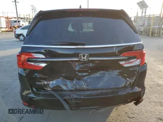 2023 Honda Odyssey EX-L with VIN 5FNRL6H66PB060032, listed as a Copart auction lot 83077304 with 15,169 mi miles and Salvage Title. Bid and sale history available at carsss.com. Image 6.