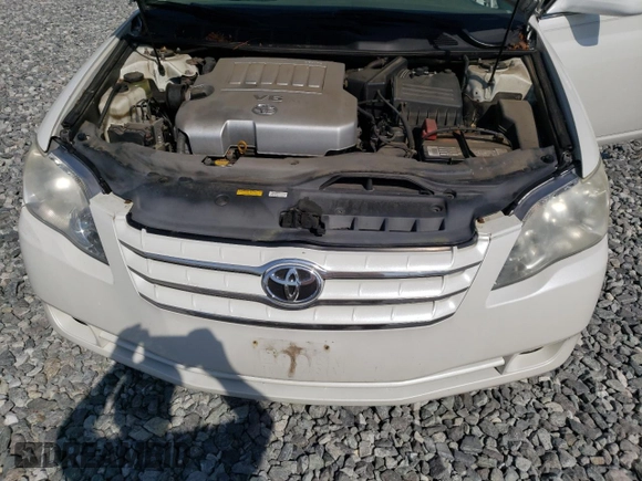 2007 Toyota Avalon XL z VIN 4T1BK36B27U215021, wystawiony jako Copart lot #56408185 z przebiegiem 202 572 mil mil oraz Czysty tytuł • Clean title. Historia ofert i sprzedaży dostępna na DreamBid. Obrazek 11.