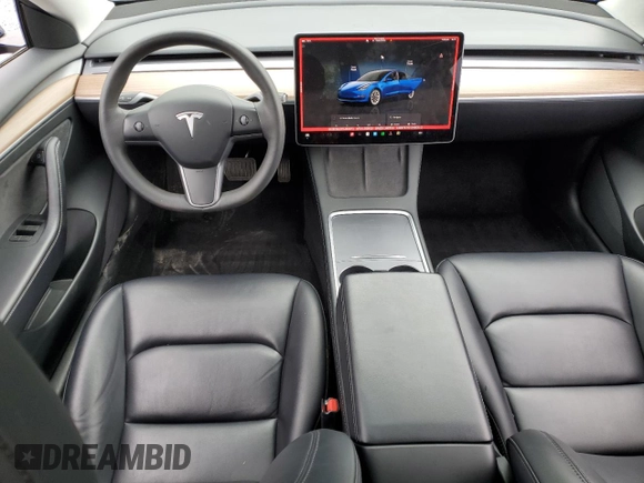 2023 Tesla Model 3 with VIN 5YJ3E1EA7PF450973, listed as a Copart auction lot 61082175 with 47,029 mi miles and Salvage title. Bid and sale history available at DreamBid. Image 8.