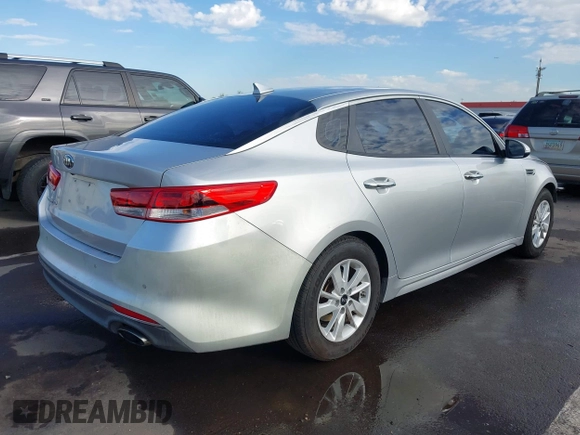 2016 Kia Optima LX with VIN 5XXGT4L38GG079249, listed as a IAAI auction lot 42674130 with 136,397 mi miles and . Bid and sale history available at DreamBid. Image 4.