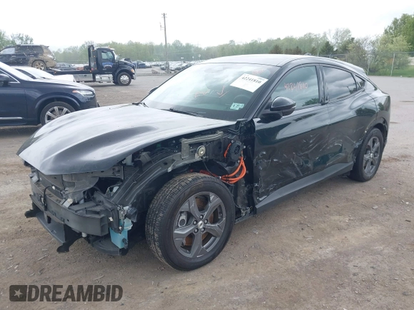 2021 Ford Mustang Mach-E Select with VIN 3FMTK1SS4MMA21329, listed as a IAAI auction lot 42241810 with 35,700 mi miles and . Bid and sale history available at DreamBid. Image 21.