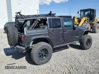 2014 Jeep Wrangler Unlimited Rubicon with VIN 1C4BJWFG0EL274480, listed as a Copart auction lot 48201845 with 130,503 mi miles and Salvage Title. Bid and sale history available at carsss.com. Image 3.