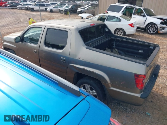 2010 Honda Ridgeline RTL with VIN 5FPYK1F50AB003576, listed as a IAAI auction lot 42050763 with 183,197 mi miles. Bid and sale history available at carsss.com. Image 3.