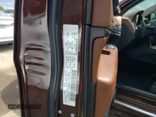 2015 Jeep Grand Cherokee Summit with VIN 1C4RJFJTXFC661574, listed as a Copart auction lot 65592954 with 110,791 mi miles and Salvage Title. Bid and sale history available at carsss.com. Image 13.
