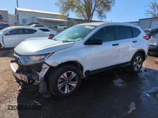 2019 Honda CR-V LX z VIN 5J6RW5H34KL005229, wystawiony jako Copart lot #53652585 z przebiegiem 57 252 mil mil oraz Szkoda całkowita • Salvage title. Historia ofert i sprzedaży dostępna na DreamBid. Obrazek 1.