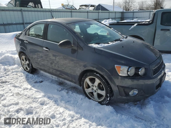 2013 Chevrolet Sonic LTZ z VIN 1G1JE5SH6D4114209, wystawiony jako Copart lot #44854675 z przebiegiem 130 385 mil mil oraz Czysty tytuł • Clean title. Historia ofert i sprzedaży dostępna na DreamBid. Obrazek 4.
