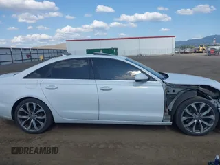 2015 Audi A6 Premium Plus with VIN WAUGFAFC9FN042616, listed as a IAAI auction lot 42496917 with 100,943 mi miles and . Bid and sale history available at DreamBid. Image 14.