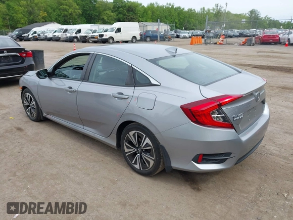 2016 Honda Civic EX-L with VIN 2HGFC1F71GH636929, listed as a IAAI auction lot 42253766 with 123,612 mi miles and . Bid and sale history available at DreamBid. Image 3.