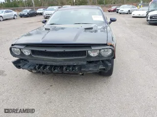 2011 Dodge Challenger with VIN 2B3CJ4DG6BH542115, listed as a IAAI auction lot 41586159 with 213,722 mi miles. Bid and sale history available at carsss.com. Image 6.