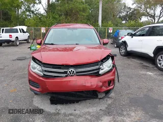 2015 Volkswagen Tiguan R-Line with VIN WVGAV7AXXFW106001, listed as a IAAI auction lot 41652896 with 131,031 mi miles and . Bid and sale history available at DreamBid. Image 13.