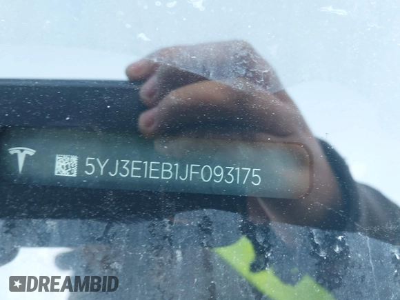 2018 Tesla Model 3 Long Range Battery z VIN 5YJ3E1EB1JF093175, wystawiony jako IAAI lot #41766128 z przebiegiem Nie podano mil oraz . Historia ofert i sprzedaży dostępna na DreamBid. Obrazek 9.