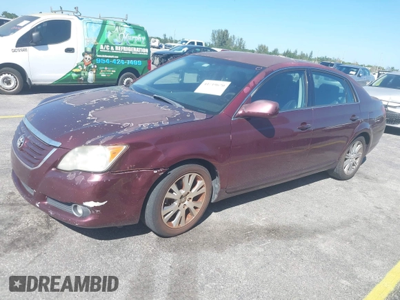 2008 Toyota Avalon XL with VIN 4T1BK36BX8U309181, listed as a IAAI auction lot 41819670 with 227,129 mi miles. Bid and sale history available at carsss.com. Image 2.