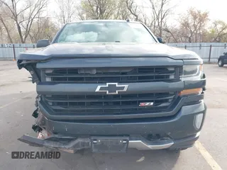 2017 Chevrolet Silverado 1500 LT with VIN 3GCUKREC7HG220780, listed as a IAAI auction lot 41978463 with 131,532 mi miles and . Bid and sale history available at DreamBid. Image 12.