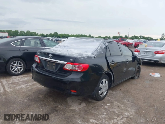 2011 Toyota Corolla L with VIN JTDBU4EE2B9158833, listed as a IAAI auction lot 42120661 with Not Provided miles. Bid and sale history available at carsss.com. Image 4.