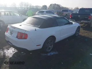 2012 Ford Mustang V6 with VIN 1ZVBP8EM0C5212707, listed as a IAAI auction lot 41775024 with 144,116 mi miles and . Bid and sale history available at carsss.com. Image 4.