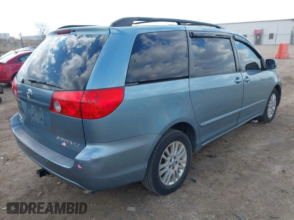 2007 Toyota Sienna XLE with VIN 5TDZK22C37S053965, listed as a IAAI auction lot 41902226 with 239,910 mi miles. Bid and sale history available at carsss.com. Image 4.