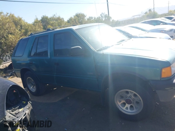 1995 Isuzu Rodeo LS z VIN 4S2CY58V6S4316697, wystawiony jako IAAI lot #42103936 z przebiegiem 143 185 mil mil oraz . Historia ofert i sprzedaży dostępna na DreamBid. Obrazek 12.