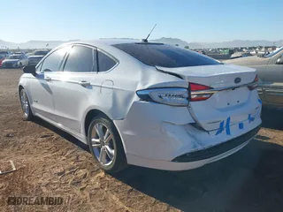 2018 Ford Fusion Hybrid S with VIN 3FA6P0UU0JR204324, listed as a IAAI auction lot 41312303 with 100,527 mi miles. Bid and sale history available at carsss.com. Image 3.
