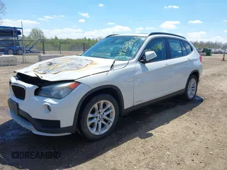 2015 BMW X1 xDrive28i with VIN WBAVL1C50FVY31341, listed as a IAAI auction lot 42048460 with 1 mi miles. Bid and sale history available at carsss.com. Image 2.