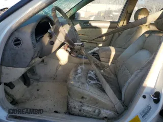 2000 Lexus LS 400 z VIN JT8BH28F0Y0175297, wystawiony jako Copart lot #75230834 z przebiegiem 293 851 mil mil oraz Szkoda całkowita • Salvage title. Historia ofert i sprzedaży dostępna na DreamBid. Obrazek 7.
