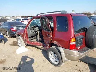 2002 Suzuki Grand Vitara JLX with VIN JS3TD62V824152943, listed as a IAAI auction lot 41668395 with 104,191 mi miles. Bid and sale history available at carsss.com. Image 3.