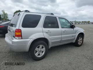 2005 Ford Escape Hybrid with VIN 1FMCU96H75KC95236, listed as a Copart auction lot 54528685 with 186,511 mi miles and Clean title. Bid and sale history available at DreamBid. Image 3.