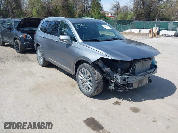 2022 Cadillac XT6 Premium Luxury with VIN 1GYKPFRS6NZ110074, listed as a IAAI auction lot 42060276 with 43,760 mi miles. Bid and sale history available at carsss.com. Image 1.