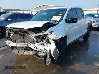 2023 Honda Ridgeline Black Edition with VIN 5FPYK3F84PB011792, listed as a IAAI auction lot 42049593 with 21,002 mi miles and . Bid and sale history available at DreamBid. Image 2.