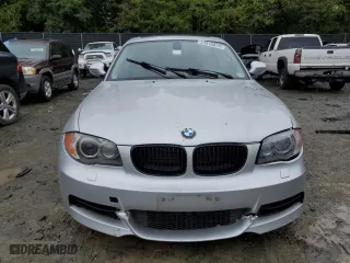 2011 BMW 1 Series 135i with VIN WBAUC9C56BVM09045, listed as a Copart auction lot 73316874 with 125,679 mi miles and Salvage Title. Bid and sale history available at carsss.com. Image 5.