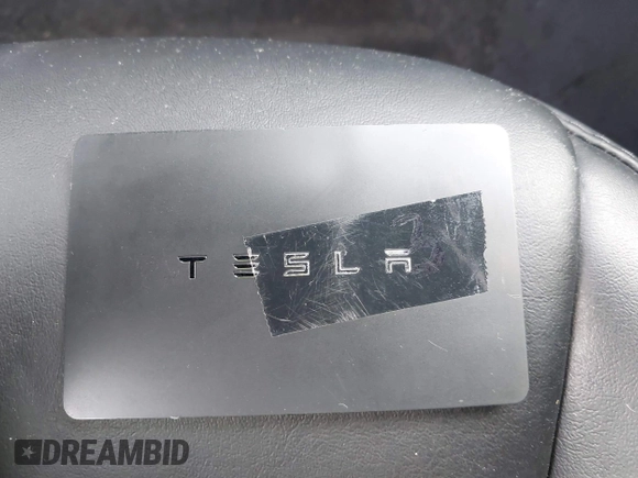 2020 Tesla Model 3 Long Range with VIN 5YJ3E1EB9LF795246, listed as a IAAI auction lot 41895750 with 163,061 mi miles and . Bid and sale history available at DreamBid. Image 11.