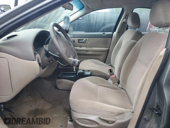 2002 Ford Taurus SE Standard с VIN 1FAFP58U62A219915, выставлен на аукционе Copart как лот 56972825 с пробегом 196 453 миль миль и Списание • Salvage title. История ставок и продаж доступна на DreamBid. Изображение 7.