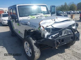 2008 Jeep Wrangler Unlimited Rubicon with VIN 1J4GA691X8L555097, listed as a IAAI auction lot 41889319 with 166,882 mi miles and . Bid and sale history available at DreamBid. Image 6.