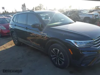 2022 Volkswagen Tiguan S with VIN 3VV1B7AX9NM124552, listed as a IAAI auction lot 41318396 with 23,863 mi miles. Bid and sale history available at carsss.com. Image 1.