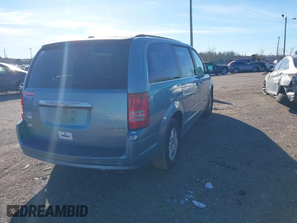 2010 Chrysler Town & Country Touring with VIN 2A4RR5D13AR308522, listed as a IAAI auction lot 41673246 with 125,647 mi miles. Bid and sale history available at carsss.com. Image 4.