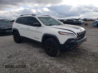 2017 Jeep Cherokee Trailhawk L Plus with VIN 1C4PJMBB7HW500120, listed as a Copart auction lot 84458794 with 157,311 mi miles and Salvage Title. Bid and sale history available at carsss.com. Image 4.