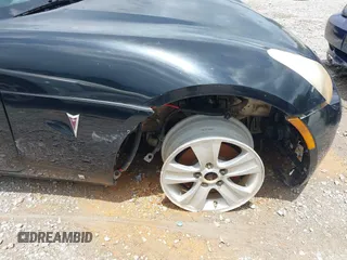 2007 Pontiac Solstice GXP z VIN 1G2MG35X17Y125299, wystawiony jako IAAI lot #42168624 z przebiegiem 123 526 mil mil oraz . Historia ofert i sprzedaży dostępna na DreamBid. Obrazek 6.