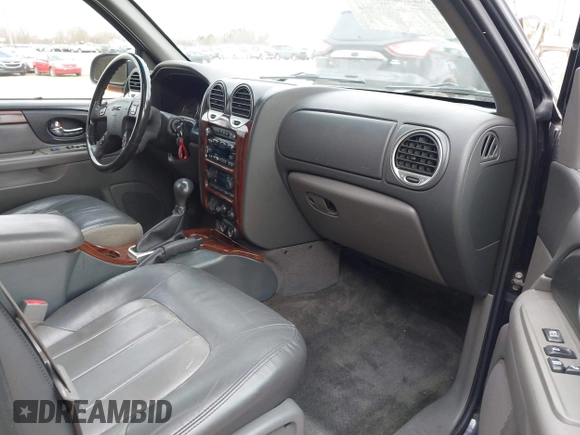 2002 GMC Envoy SLT with VIN 1GKDT13S622506181, listed as a IAAI auction lot 41986061 with 212,583 mi miles. Bid and sale history available at carsss.com. Image 5.