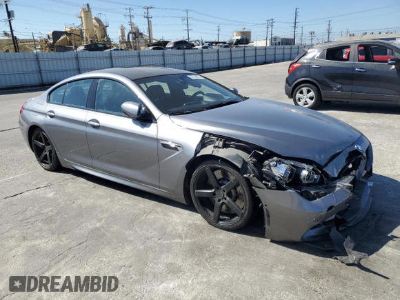 2015 BMW M6 z VIN WBS6C9C56FD467608, wystawiony jako Copart lot #67796074 z przebiegiem 67 706 mil mil oraz Szkoda całkowita • Salvage title. Historia ofert i sprzedaży dostępna na DreamBid. Obrazek 4.