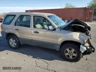 2007 Ford Escape XLS with VIN 1FMYU02Z77KB76668, listed as a Copart auction lot 73338784 with 166,759 mi miles and Salvage Title. Bid and sale history available at carsss.com. Image 4.