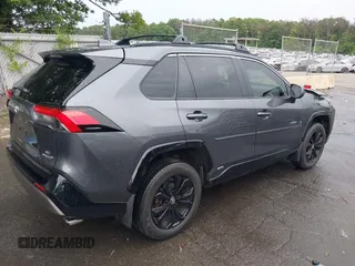 2022 Toyota RAV4 Hybrid SE with VIN JTM16RFV7ND067284, listed as a IAAI auction lot 42637821 with 20,512 mi miles and . Bid and sale history available at DreamBid. Image 4.