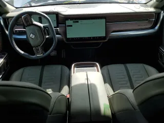 2023 Rivian R1S Adventure z VIN 7PDSGABA3PN024458, wystawiony jako Copart lot #74087714 z przebiegiem 3 505 mil mil oraz Nie do naprawy • Non repairable. Historia ofert i sprzedaży dostępna na DreamBid. Obrazek 8.